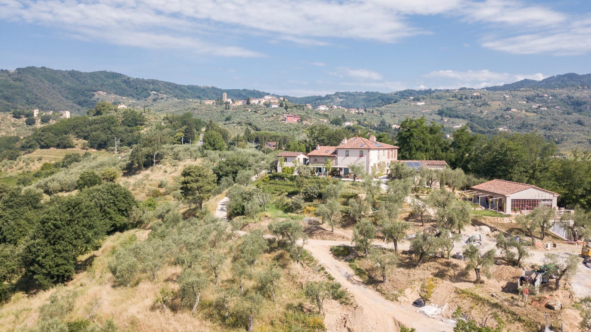Rent Villa Neri for a unique Tuscan getaway. 7 bedrooms, 7+3 baths, stunning countryside views. Explore Florence and Lucca nearby.